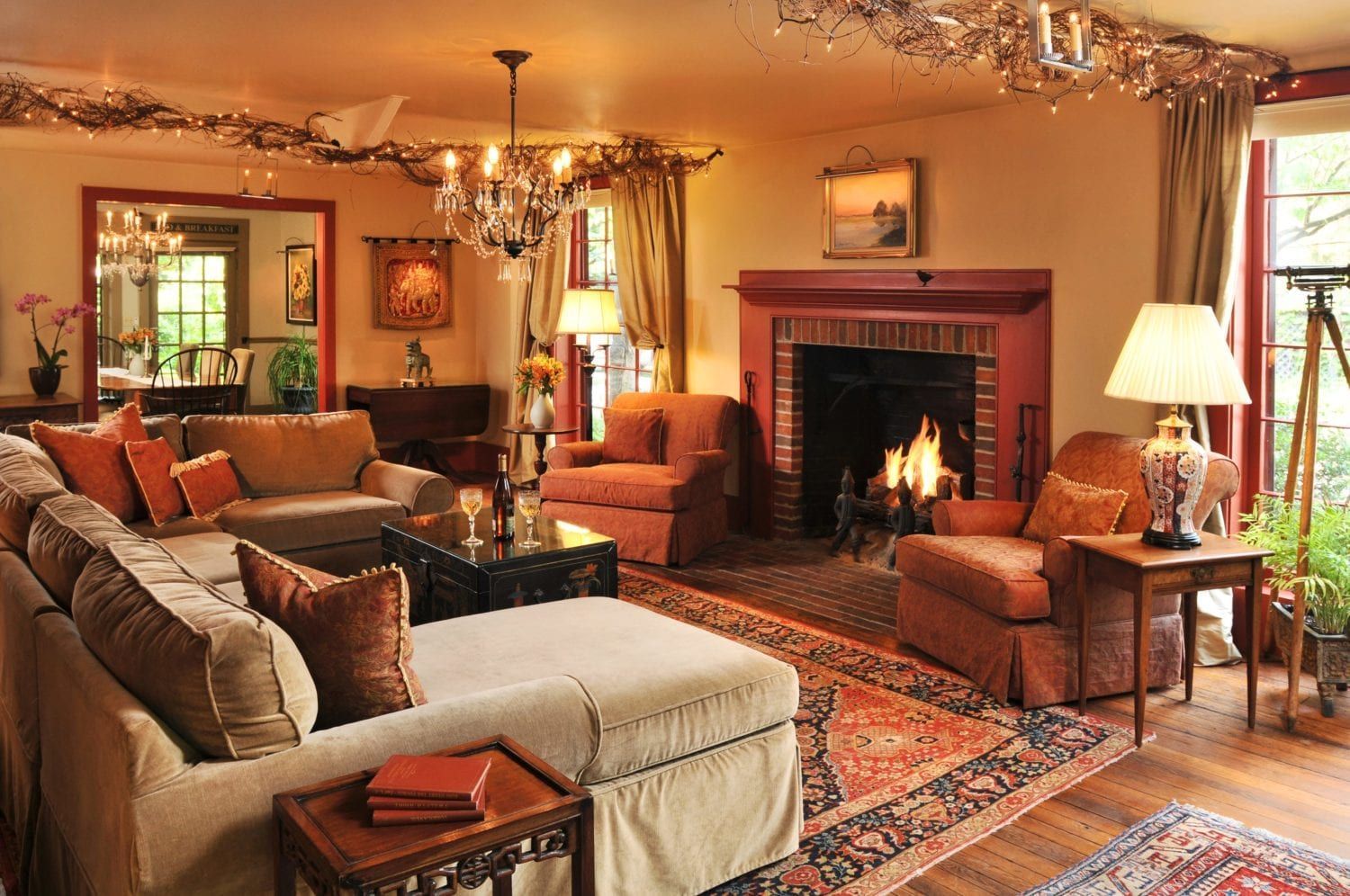 A living room filled with furniture and a fireplace.
