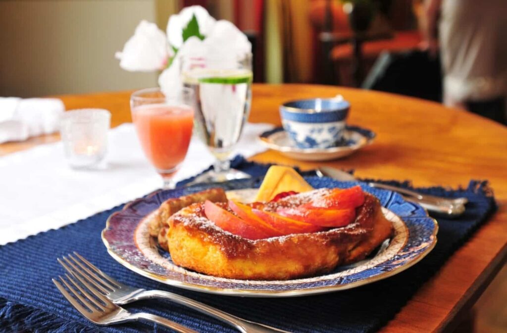 A plate of food on a table with a fork.